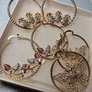 Gold and Silver Hoop Earrings with Butterfly and Leaf Design